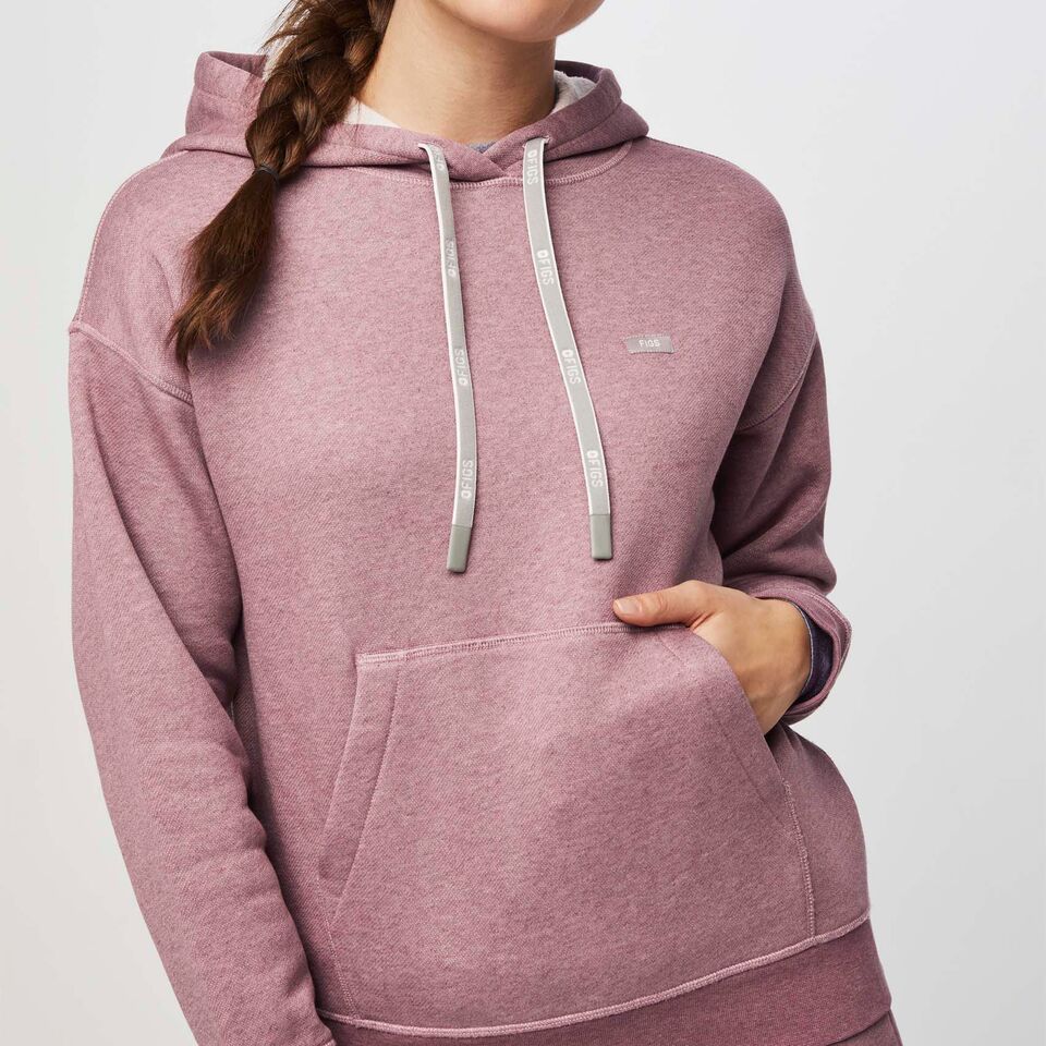 https://creative.wearfigs.com/asset/228d8b5a-6373-4c9f-9512-7f44083efe2a/SQUARE/XS_W_Hoodie_Heather_Dark_Mauve_Q3_2022_-07