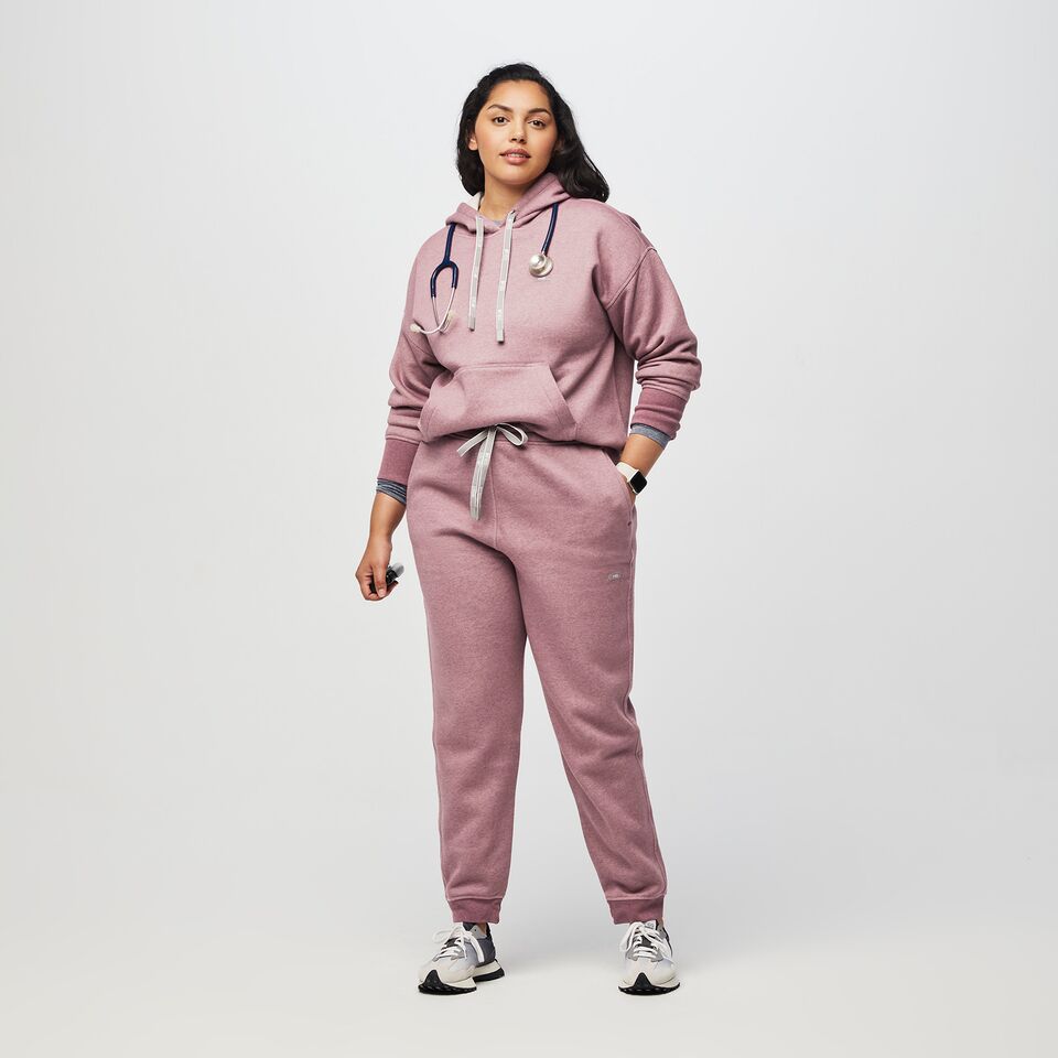 https://creative.wearfigs.com/asset/4e331bb3-443b-4635-b8ef-e5028b54788d/SQUARE/XL_W_Hoodie_Heather_Dark_Mauve_Q3_2022_-1