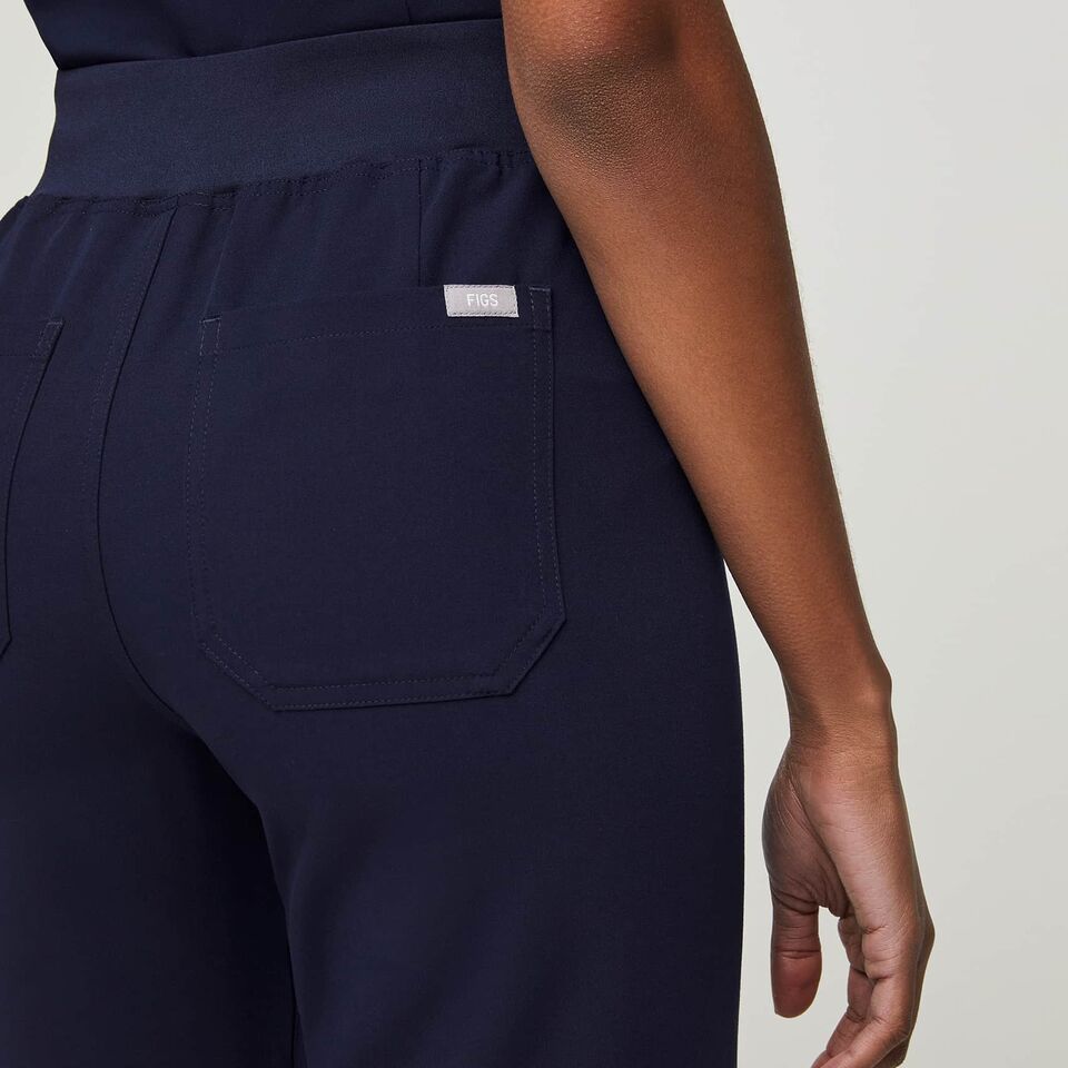 https://creative.wearfigs.com/asset/65c352df-11d3-46af-81cc-f7a0253d8b75/SQUARE/Women-Livingston-High-Waisted-Scrub-Pant-navy-3-jpg