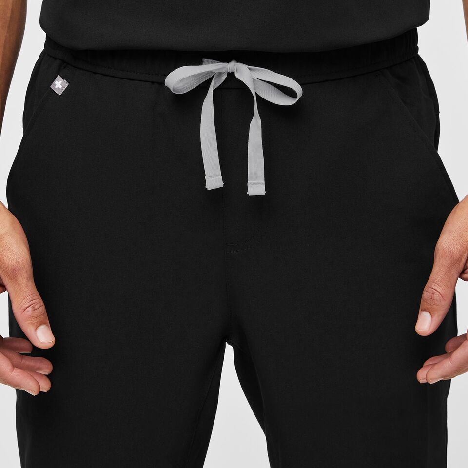 https://creative.wearfigs.com/asset/c69ec839-5226-4f51-bb2e-cbc7a68f149d/SQUARE/Mens-Tansen-Scrub-Pant-black-M-6-jpg
