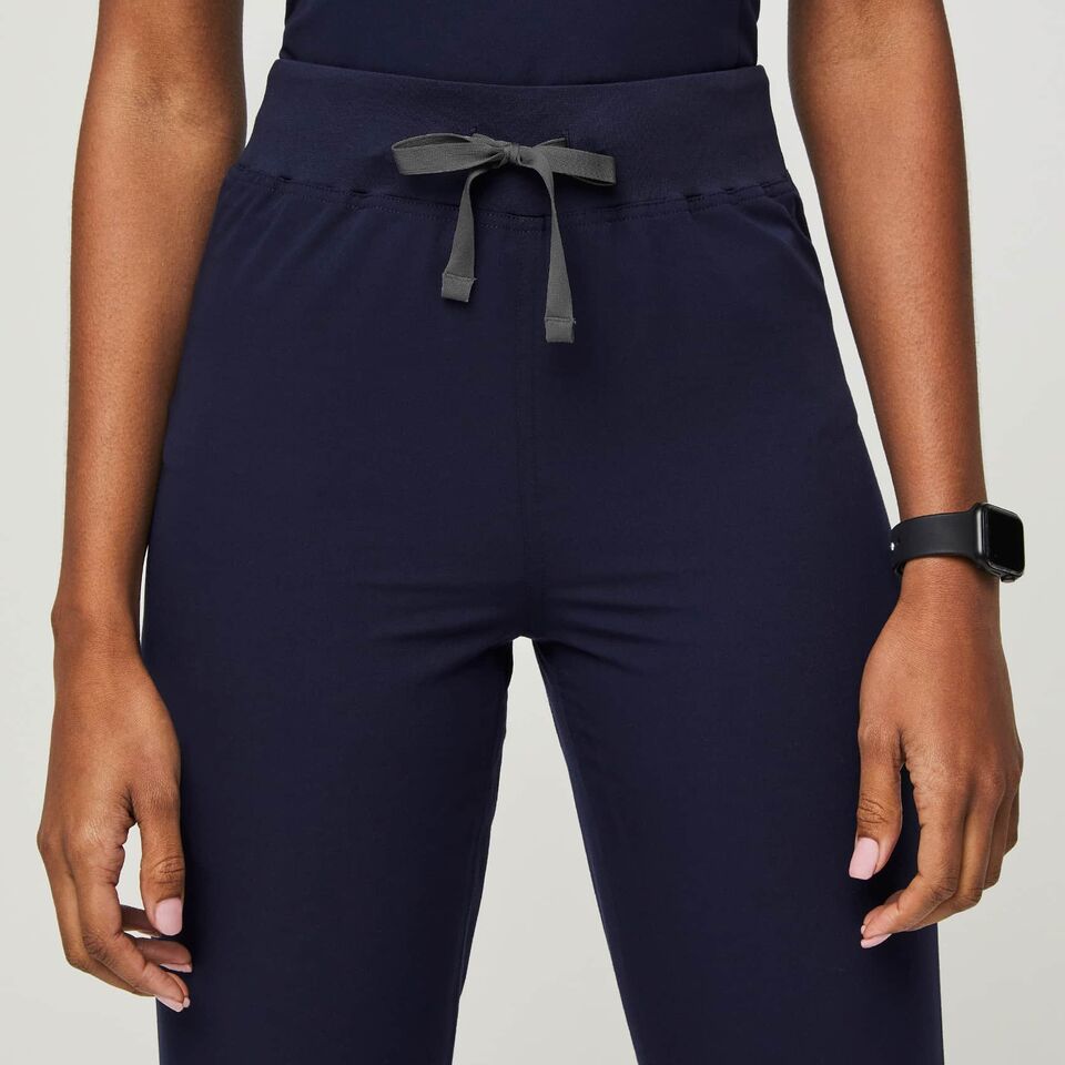 https://creative.wearfigs.com/asset/fc6da0ad-8fd1-4957-9538-ce23eaebd9f0/SQUARE/Women-Livingston-High-Waisted-Scrub-Pant-navy-5-jpg