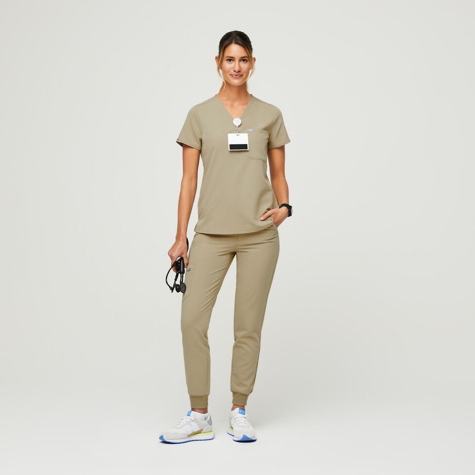 https://creative.wearfigs.com/m/63d2cf46e3ec903b/SQUARE-W_Catarina_Sandstone_Q2_2022_-2