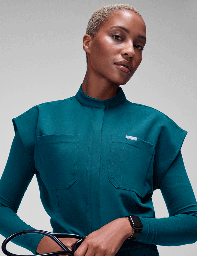 Your Favourites—Here to Stay. Caribbean Blue and the Rafaela Wide Leg ScrubJumpsuit™ are now Core Collection official.