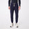 https://cdn.shopify.com/s/files/1/0139/8942/files/2025_Q2_04_NAVY_ADRIANSLIMJOGGER_DAVEY_1434_c2a51484-02a0-490c-9265-21500c7bbe01.jpg?v=1743703320