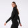 https://cdn.shopify.com/s/files/1/0139/8942/files/2025_Q2_05_BLACK_LOMITA-FULL-ZIP_MADI_1461.jpg?v=1751324116