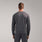 https://cdn.shopify.com/s/files/1/0139/8942/files/2025_Q2_05_CHARCOAL_DESTINLSFORMXSCRUBTOP_DAVEY_394.jpg?v=1747175611