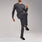 https://cdn.shopify.com/s/files/1/0139/8942/files/2025_Q2_05_CHARCOAL_NORRISFORMXSCRUBPANT_DAVEY_606_v2_f32a4f64-13d2-444d-a33e-8483935fbf05.jpg?v=1747175981