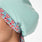 https://cdn.shopify.com/s/files/1/0139/8942/files/2025_Q2_05_SEAGLASS_FARIDASCRUBCAP_LAURYN_465.jpg?v=1745437289