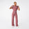 https://cdn.shopify.com/s/files/1/0139/8942/files/2025_Q2_06_MAUVE_RAFAELA-WIDELEG-JUMPSUIT_DEJA_279_3e8c53f6-7f08-4be4-8069-dbdd1eee5e96.jpg?v=1749579324