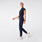 https://cdn.shopify.com/s/files/1/0139/8942/files/2025_Q2_06_NAVY_RAFAELA-JUMPSUIT_ANNIE_1196_a9f87682-d778-4fa3-9d55-c0c083777803.jpg?v=1749662052