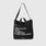 https://cdn.shopify.com/s/files/1/0139/8942/files/2025_Q3_07_BLACK_TOTE_GHOST_1155.jpg?v=1751410398