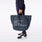 https://cdn.shopify.com/s/files/1/0139/8942/files/2025_Q3_07_DARK-HARBOR_TOTE_GABE_050.jpg?v=1751410783