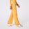 https://cdn.shopify.com/s/files/1/0139/8942/files/2025_Q3_07_Dandelion_Isabel-Wide-Leg_Charo_491_8841ffae-ad9f-4f09-8860-a6ce67c712e7.jpg?v=1752693576