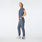https://cdn.shopify.com/s/files/1/0139/8942/files/2025_Q3_08_HEATHERDENIM_RAFAELAJUMPSUIT_NAT_191_f2f59621-3e78-4699-9a51-3cccdfab536d.jpg?v=1753887153