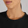https://cdn.shopify.com/s/files/1/0139/8942/files/2025_Q3_09_BLACK_ALMA-TUNIC-CREWNECK_COLETTE_1333.jpg?v=1756842657