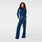 https://cdn.shopify.com/s/files/1/0139/8942/files/2026_Q1_01_TEAM-USA-BLUE_TEAM-USA-FIBREX-MOCK-NECK-WIDE-LEG-SCRUB-JUMPSUIT_LAURYN_1985_3673475f-3573-405f-8c27-9dfb76b1c39b.jpg?v=1771824037
