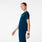 https://cdn.shopify.com/s/files/1/0139/8942/files/2026_Q1_02_DEEP-REEF_PAGOSA-SCRUB-V-NECK_JASMINE_1101.jpg?v=1774919946