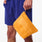 https://cdn.shopify.com/s/files/1/0139/8942/files/2026_Q1_03_ORANGE-TAFFY_CANVAS-POUCH_LAURENCE_00740.jpg?v=1777073443