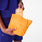 https://cdn.shopify.com/s/files/1/0139/8942/files/2026_Q1_03_ORANGE-TAFFY_CANVAS-POUCH_LAURENCE_00747.jpg?v=1777073443