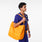 https://cdn.shopify.com/s/files/1/0139/8942/files/2026_Q1_03_ORANGE-TAFFY_TOTE_LAURENCE_01264.jpg?v=1777425859