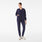 https://cdn.shopify.com/s/files/1/0139/8942/files/2026_Q3_07_NAVY_CLAIRESCRUBJACKET_TEVIA_1820.jpg?v=1782942761