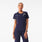 https://cdn.shopify.com/s/files/1/0139/8942/files/2026_Q3_07_NAVY_ELIZA-SLIM-SCRUBTOP_DEJA_1808.jpg?v=1783958810