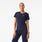 https://cdn.shopify.com/s/files/1/0139/8942/files/2026_Q3_07_NAVY_ELIZA-SLIM-SCRUBTOP_DEJA_1819.jpg?v=1783958810
