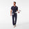 https://cdn.shopify.com/s/files/1/0139/8942/files/2026_Q3_07_NAVY_FIGS_LOGO_BADGE_REEL_DAVEY_2335_V2.jpg?v=1782525848