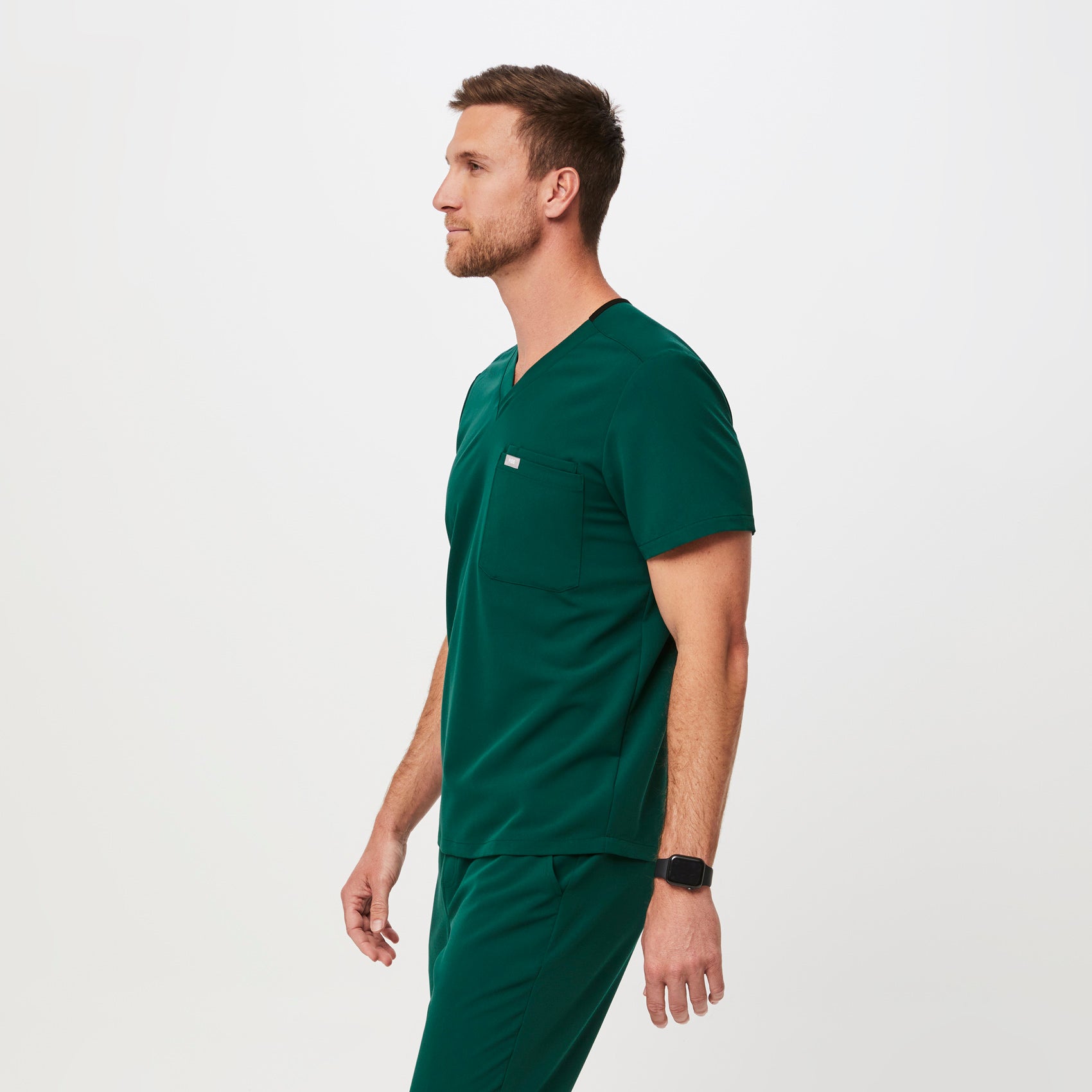 Men's Leon™ ThreePocket Scrub Top Forest Green · FIGS