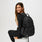 https://cdn.shopify.com/s/files/1/0139/8942/files/Q1_2023_03_BLACK_QUILTED-PUFFER-BACKPACK_U_MADI_54238.jpg?v=1682458429