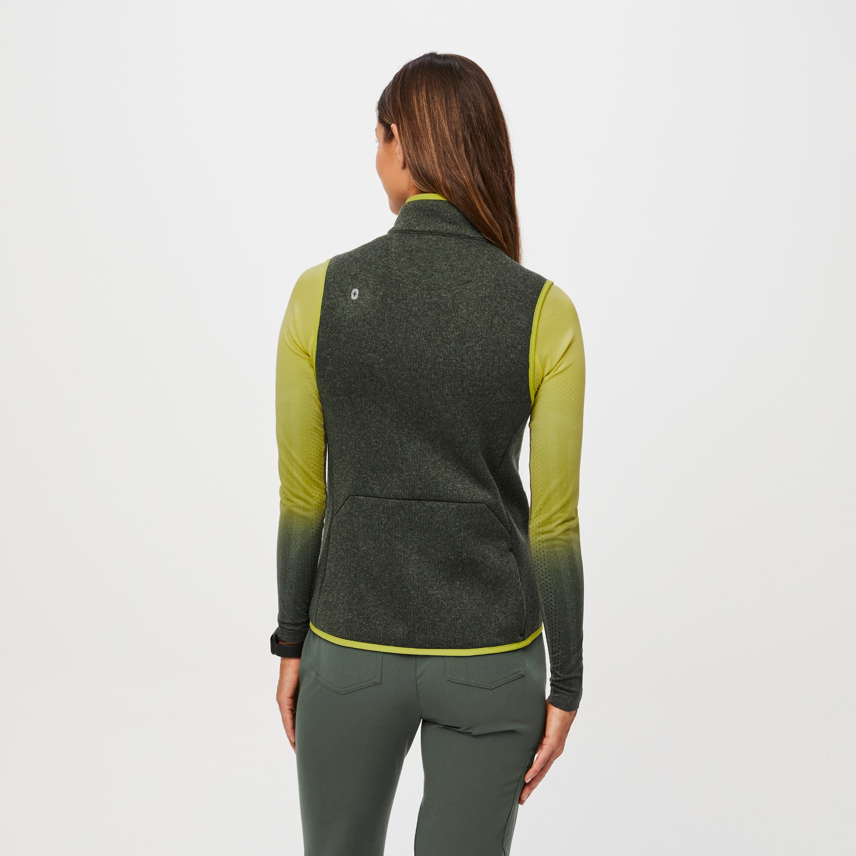 https://cdn.shopify.com/s/files/1/0139/8942/files/Q1_2023_03_HEATHERED-MOSS_SWEATERKNIT-VEST_W_MADI_53811.jpg?v=1682634943