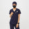 https://cdn.shopify.com/s/files/1/0139/8942/files/Q1_2023_03_NAVY_SCRUB-CAP-BUTTONHOLES_CORE-REFRESH_U_EMILY_53286_8425c6d8-1c76-4cc6-a466-1f0fa2bb544f.jpg?v=1738863851