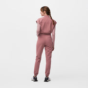 https://cdn.shopify.com/s/files/1/0139/8942/files/Q1_2023_12_MAUVE_RAFAELA-JUMPSUIT_MELANIE_118.jpg?v=1705529485