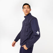 https://cdn.shopify.com/s/files/1/0139/8942/files/Q1_2023_12_NAVY_EXTREMESJACKET_M_SCOTT_1138.jpg?v=1706725549