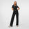 https://cdn.shopify.com/s/files/1/0139/8942/files/Q1_2024_1_BLACK_WIDE_LEG_PANT_W_CHARO_2224_1.jpg?v=1755104599