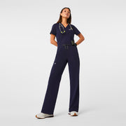 https://cdn.shopify.com/s/files/1/0139/8942/files/Q1_2024_1_NAVY_WIDELEGPANT_W_CHARO_2224_20a7cb20-0076-442e-a2d4-d226725e03bb.jpg?v=1725914657