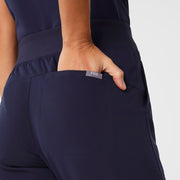 https://cdn.shopify.com/s/files/1/0139/8942/files/Q1_2024_1_NAVY_WIDELEGPANT_W_CHARO_2261_84bbea4d-fef4-4649-9665-4e3858b85fa9.jpg?v=1725914657