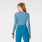 https://cdn.shopify.com/s/files/1/0139/8942/files/Q1_2024_2_HEATHEREDEXTREMEBLUE_LOGOSALTABODYSUIT_W_CLARA_3068.jpg?v=1710370402
