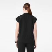 https://cdn.shopify.com/s/files/1/0139/8942/files/Q1_2025_01_BLACK_CAROLINARELAXEDTOP_MELANIE_1605.jpg?v=1741015210