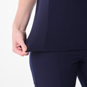 https://cdn.shopify.com/s/files/1/0139/8942/files/Q1_2025_01_NAVY_EVERLYSLIMNECKTOP_MELANIE_1404.jpg?v=1741015460
