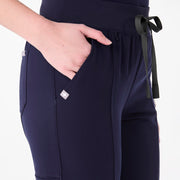 https://cdn.shopify.com/s/files/1/0139/8942/files/Q1_2025_01_NAVY_MADRYNHWFLAREPANT_MELANIE_1456_a50d1bf1-deac-46b6-a0eb-4e938669c65f.jpg?v=1741016838