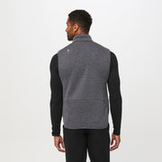 https://cdn.shopify.com/s/files/1/0139/8942/files/Q2_2023_04_HEATHERED-DARK-CHARCOAL_SWEATER-KNIT-VEST_CORE-REFRESH_M_GABE_04594_bed2cde0-3c9f-411c-8b38-8d3e884dd5be.jpg?v=1690321744