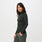 https://cdn.shopify.com/s/files/1/0139/8942/files/Q2_2023_04_MOSS_SALTA-SEAMLESS-FULL-ZIP_W_LOGAN_07169.jpg?v=1682690863