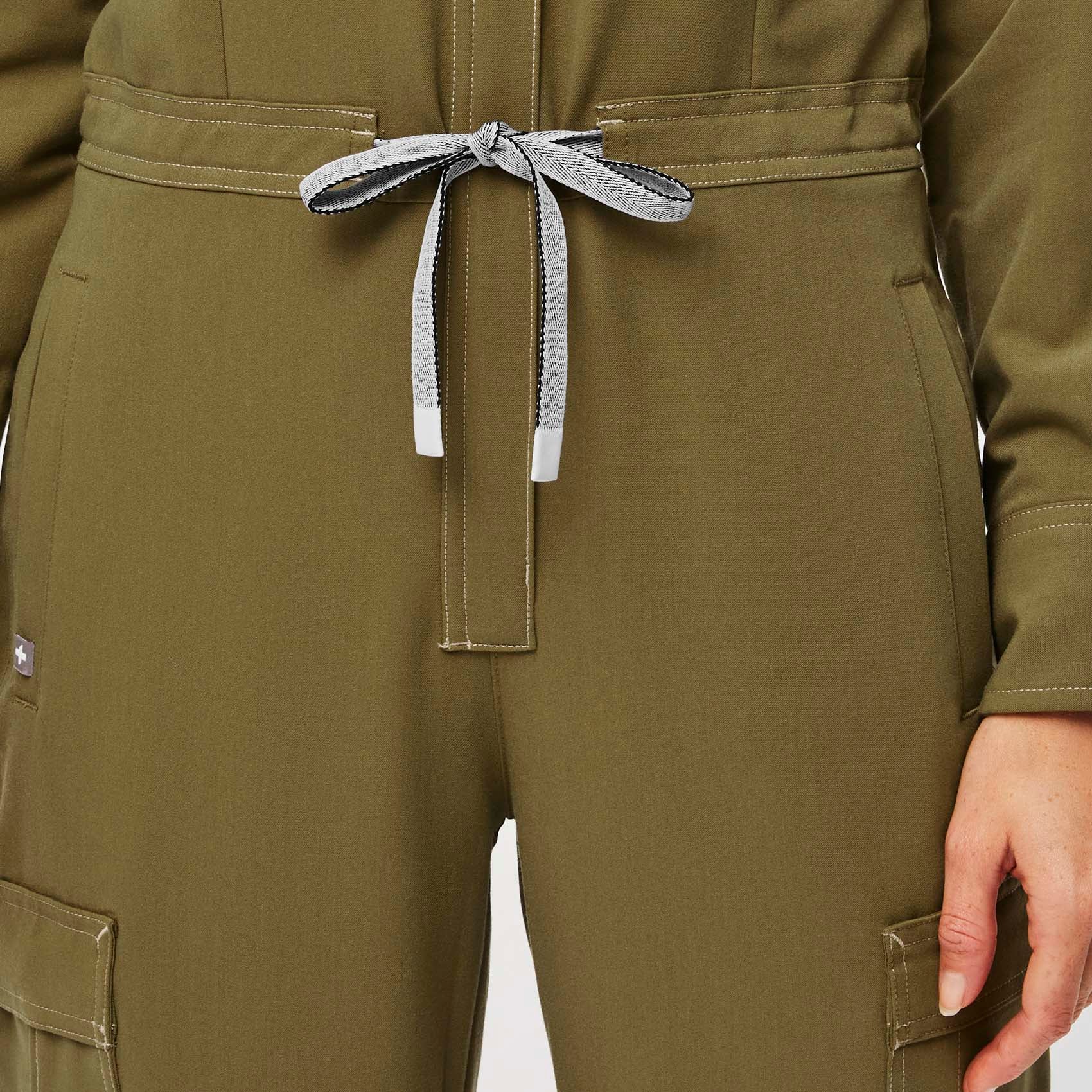 https://cdn.shopify.com/s/files/1/0139/8942/files/Q2_2023_05_MARTINI-OLIVE_MILLER-JUMPSUIT_W_PALONIA_18907.jpg?v=1689197869