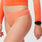 https://cdn.shopify.com/s/files/1/0139/8942/files/Q2_2023_05_PAPAYA_THONG_W_PALONIA_19267.jpg?v=1688673670