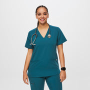 Blusa de uniforme médico con tres bolsillos para mujer