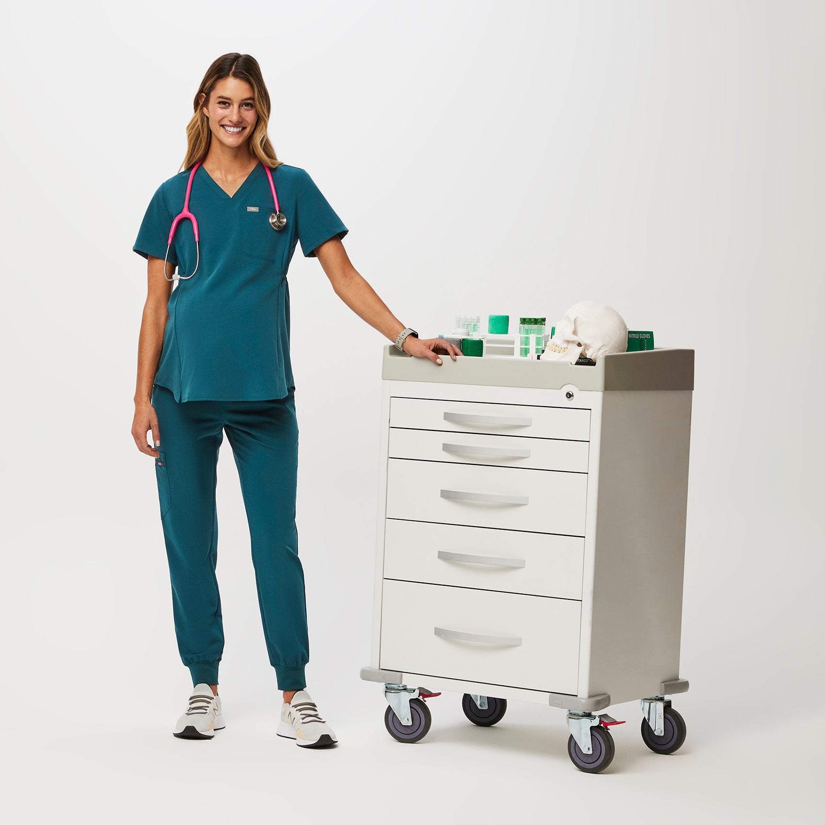 https://cdn.shopify.com/s/files/1/0139/8942/files/Q2_2023_06_CARIBBEAN-BLUE_OCTAVIA-MATERNITY-TOP_W_MADI_35498.jpg?v=1689701349