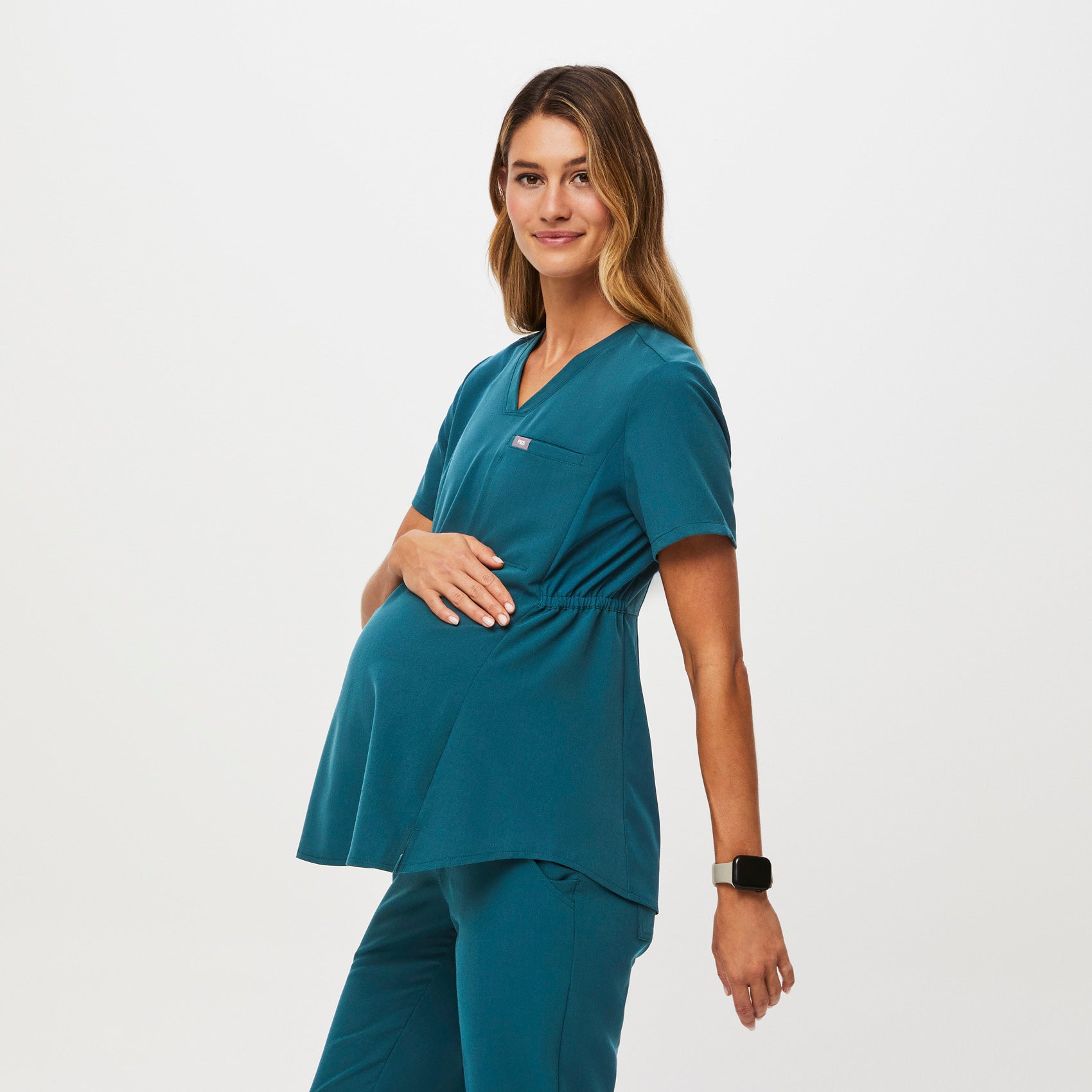 https://cdn.shopify.com/s/files/1/0139/8942/files/Q2_2023_06_CARIBBEAN-BLUE_OCTAVIA-MATERNITY-TOP_W_MADI_35541.jpg?v=1689701347
