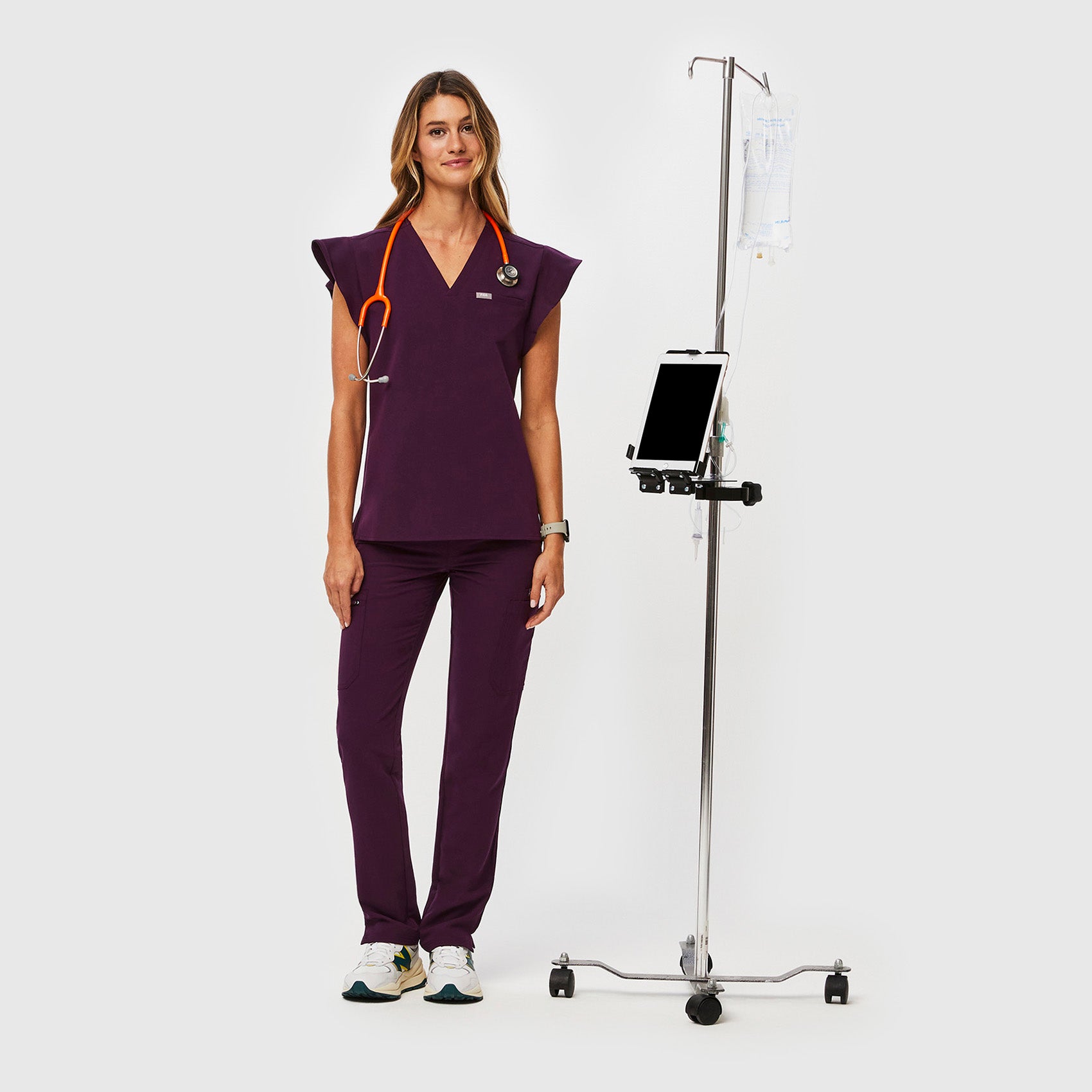 https://cdn.shopify.com/s/files/1/0139/8942/files/Q2_2023_06_DEEP-PURPLE_NATAL-FLUTTER-TOP_W_MADI_36350_35f3527b-f3d7-4890-bcc6-e6882593a01d.jpg?v=1690225317