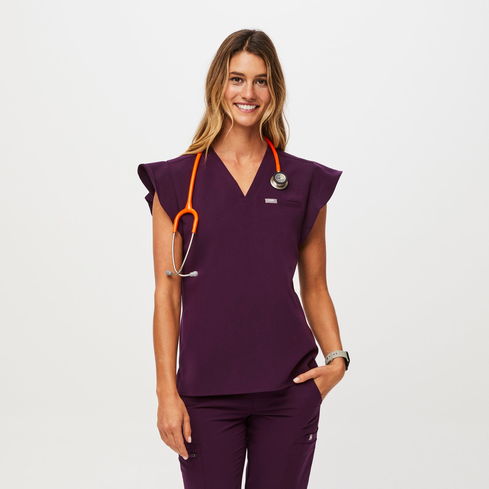 https://cdn.shopify.com/s/files/1/0139/8942/files/Q2_2023_06_DEEP-PURPLE_NATAL-FLUTTER-TOP_W_MADI_36381_5ef70d17-b509-46d8-a0fb-76f537e23085.jpg?v=1691600305